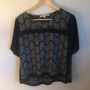 Black and cream geometric print short sleeve blouse